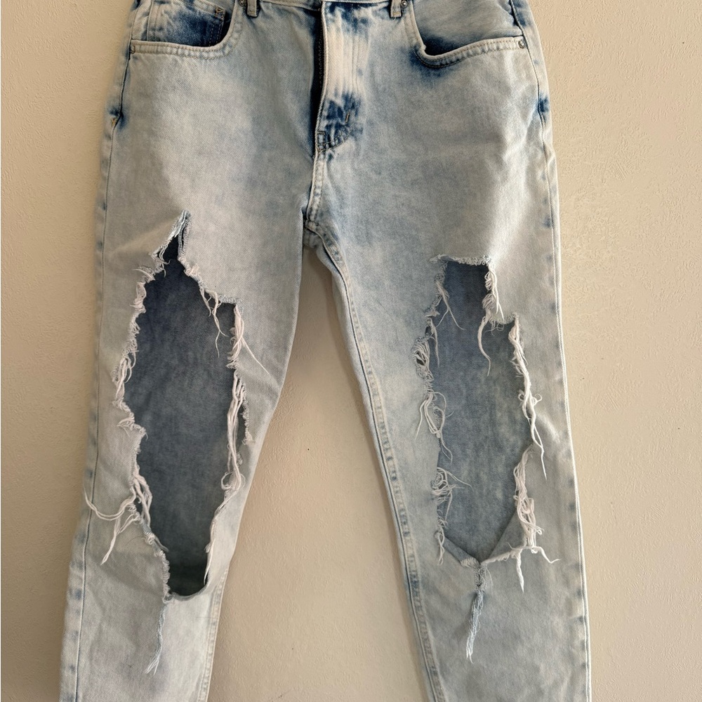 Distressed Light Blue Jeans